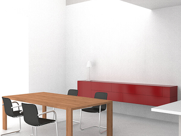 Holztisch, schwarze Stühle und rotes Sideboard